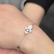 fatima-keze-hamsa-karkoto-ezust-heim-ekszer-webaruhaz