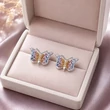 Swarovski kövekkel díszített ezüst pillangó fülbevaló díszdobozban a Heim Ékszer Webáruházból